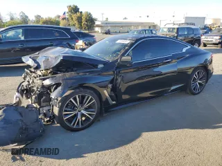 2020 Infiniti Q60 Luxe with VIN JN1EV7EK5LM340867, listed as a Copart auction lot 74390004 with 69,613 mi miles and Salvage Title. Bid and sale history available at carsss.com. Image 1.