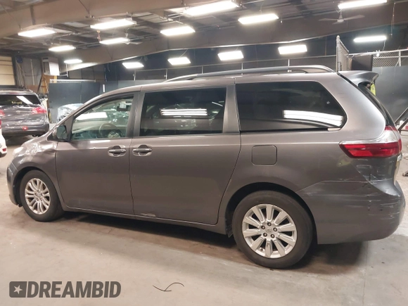 2015 Toyota Sienna XLE with VIN 5TDYK3DC3FS677780, listed as a IAAI auction lot 42155459 with 102,355 mi miles. Bid and sale history available at carsss.com. Image 14.