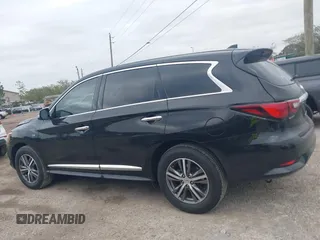 2020 Infiniti QX60 Pure with VIN 5N1DL0MN0LC527050, listed as a IAAI auction lot 41734032 with 71,204 mi miles and . Bid and sale history available at DreamBid. Image 14.