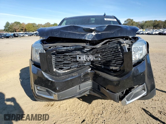 2018 GMC Yukon Denali with VIN 1GKS2CKJ3JR404177, listed as a Copart auction lot 82577354 with 129,744 mi miles and Salvage Title. Bid and sale history available at carsss.com. Image 5.