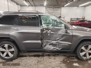 2014 Jeep Grand Cherokee Limited with VIN 1C4RJFBGXEC571146, listed as a IAAI auction lot 41337818 with 211,318 mi miles. Bid and sale history available at carsss.com. Image 14.