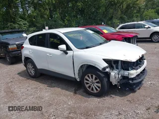 2016 Mazda CX-5 Sport with VIN JM3KE2BY6G0641051, listed as a IAAI auction lot 39959322 with 118,453 mi miles. Bid and sale history available at carsss.com. Image 1.