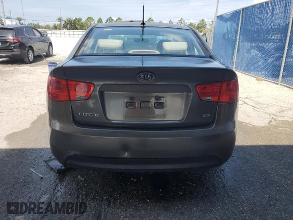 2010 Kia Forte EX z VIN KNAFU4A20A5295544, wystawiony jako Copart lot #58595625 z przebiegiem 322 520 mil mil oraz Szkoda całkowita • Salvage title. Historia ofert i sprzedaży dostępna na DreamBid. Obrazek 6.