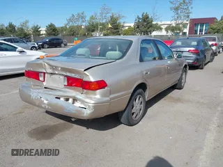 2000 Toyota Camry LE z VIN JT2BF22K5Y0258522, wystawiony jako IAAI lot #41998874 z przebiegiem 300 186 mil mil oraz . Historia ofert i sprzedaży dostępna na DreamBid. Obrazek 4.