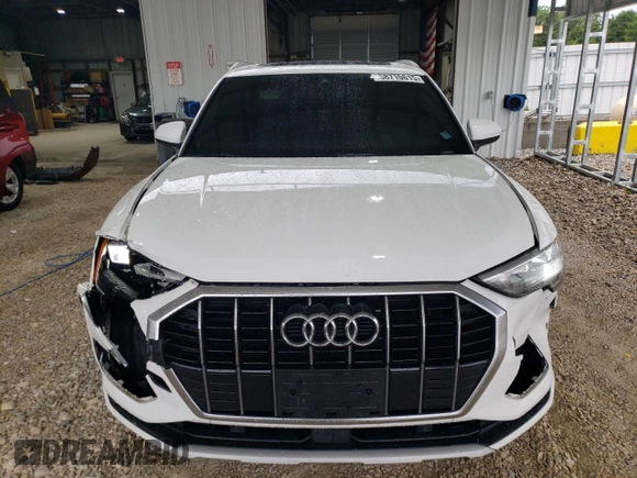 2021 Audi Q3 Premium with VIN WA1AUCF3XM1094216, listed as a Copart auction lot 58710615 with 86,743 mi miles and Salvage title. Bid and sale history available at DreamBid. Image 5.