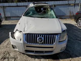 2009 Mercury Mariner Premier with VIN 4M2CU87G79KJ14527, listed as a Copart auction lot 76953474 with 0 mi miles and Salvage Title. Bid and sale history available at carsss.com. Image 5.