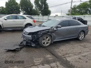 2015 Volkswagen Passat SE with VIN 1VWBV7A34FC051839, listed as a Copart auction lot 61466375 with 127,092 mi miles and Salvage title. Bid and sale history available at DreamBid. Image 1.