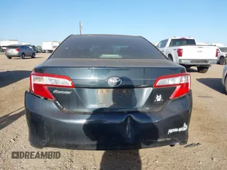 2014 Toyota Camry L with VIN 4T4BF1FK9ER363906, listed as a IAAI auction lot 41850751 with 207,368 mi miles and . Bid and sale history available at DreamBid. Image 16.