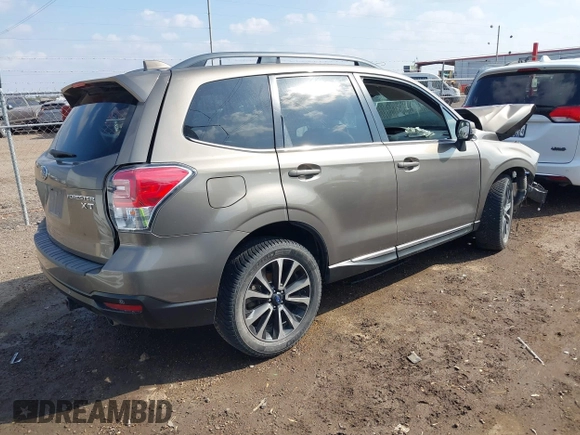 2017 Subaru Forester Touring with VIN JF2SJGWC5HH465520, listed as a IAAI auction lot 41498085 with 1 mi miles. Bid and sale history available at carsss.com. Image 4.