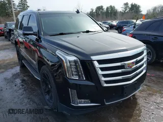 2019 Cadillac Escalade z VIN 1GYS4AKJ1KR201651, wystawiony jako IAAI lot #41622368 z przebiegiem 95 201 mil mil oraz . Historia ofert i sprzedaży dostępna na DreamBid. Obrazek 1.