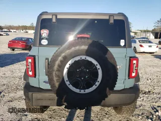 2023 Ford Bronco z VIN 1FMEE5DP0PLB15763, wystawiony jako Copart lot #45592725 z przebiegiem 26 672 mil mil oraz Szkoda całkowita • Salvage title. Historia ofert i sprzedaży dostępna na DreamBid. Obrazek 6.