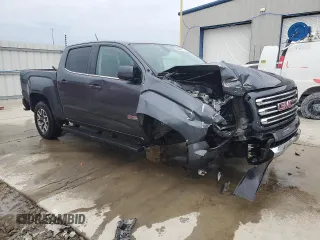 2016 GMC Canyon 4WD SLE with VIN 1GTG6CE36G1374456, listed as a Copart auction lot 52864115 with 63,892 mi miles and Salvage title. Bid and sale history available at DreamBid. Image 4.
