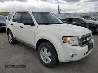 2009 Ford Escape XLS with VIN 1FMCU92749KB31140, listed as a Copart auction lot 53645705 with 213,481 mi miles and Salvage title. Bid and sale history available at DreamBid. Image 4.