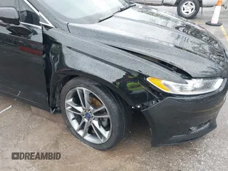 2016 Ford Fusion Titanium with VIN 3FA6P0K90GR273795, listed as a IAAI auction lot 41931175 with 108,531 mi miles and . Bid and sale history available at carsss.com. Image 6.
