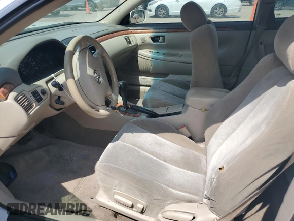 2002 Toyota Solara SE z VIN 2T1CE22P42C005554, wystawiony jako Copart lot #57756005 z przebiegiem 317 340 mil mil oraz Szkoda całkowita • Salvage title. Historia ofert i sprzedaży dostępna na DreamBid. Obrazek 7.
