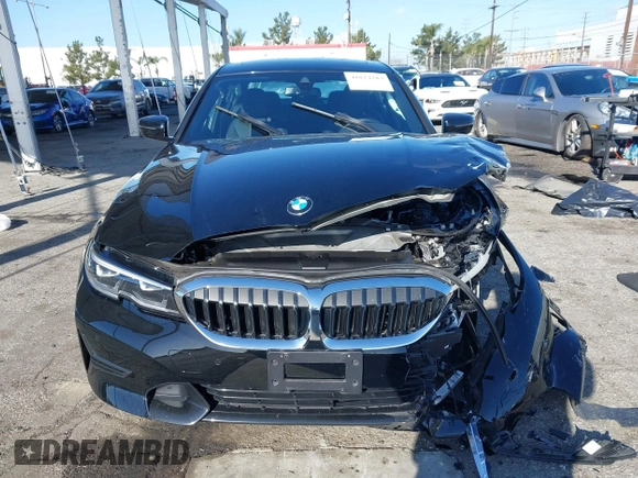 2021 BMW 3 Series 330i with VIN 3MW5R1J00M8B85692, listed as a IAAI auction lot 41824283 with 21,040 mi miles. Bid and sale history available at carsss.com. Image 6.