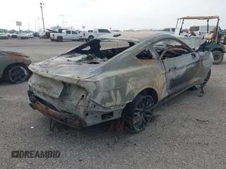 2020 Ford Mustang GT with VIN 1FA6P8CF8L5174979, listed as a IAAI auction lot 41798920 with 59,558 mi miles and . Bid and sale history available at DreamBid. Image 4.