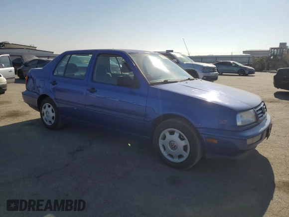 1998 Volkswagen Jetta z VIN 3VWRB81H3WM156525, wystawiony jako Copart lot #42262735 z przebiegiem 83 473 mil mil oraz Czysty tytuł • Clean title. Historia ofert i sprzedaży dostępna na DreamBid. Obrazek 4.