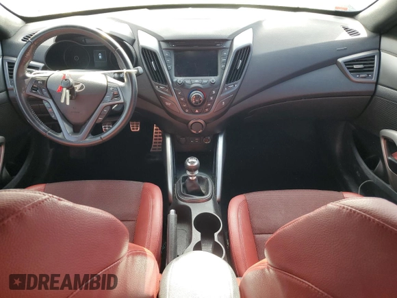 2016 Hyundai Veloster Turbo z VIN KMHTC6AE6GU302201, wystawiony jako Copart lot #54613235 z przebiegiem 105 796 mil mil oraz Szkoda całkowita • Salvage title. Historia ofert i sprzedaży dostępna na DreamBid. Obrazek 8.