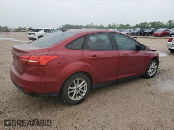 2017 Ford Focus SE z VIN 1FADP3F25HL299153, wystawiony jako Copart lot #53908065 z przebiegiem 108 745 mil mil oraz Szkoda całkowita • Salvage title. Historia ofert i sprzedaży dostępna na DreamBid. Obrazek 3.