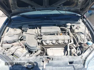 2003 Honda Civic EX with VIN 1HGEM229X3L065427, listed as a IAAI auction lot 42168594 with 164,547 mi miles and . Bid and sale history available at DreamBid. Image 10.