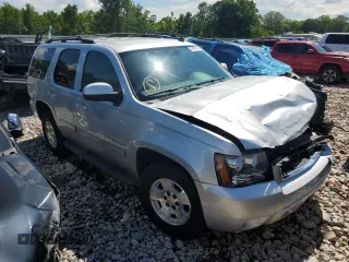 2014 Chevrolet Tahoe LT with VIN 1GNSCBE0XER117275, listed as a Copart auction lot 55858125 with 163,061 mi miles and Salvage title. Bid and sale history available at DreamBid. Image 4.
