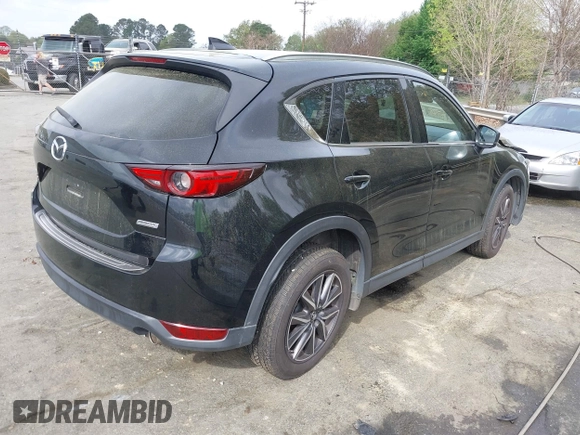 2018 Mazda CX-5 Grand Touring with VIN JM3KFBDM1J0358197, listed as a IAAI auction lot 41967940 with 148,119 mi miles and . Bid and sale history available at DreamBid. Image 4.