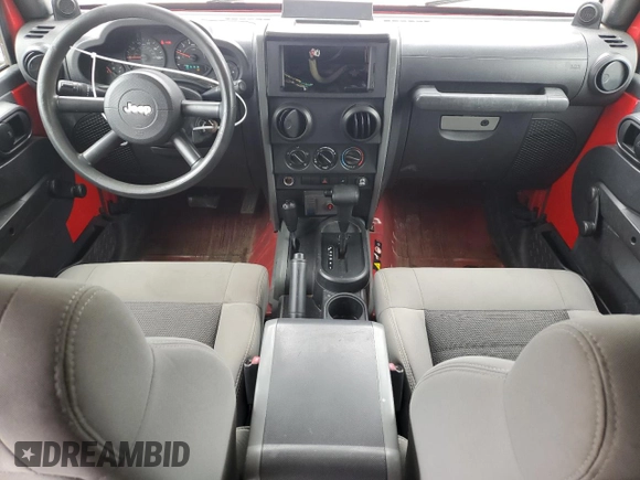 2008 Jeep Wrangler Unlimited X with VIN 1J4GA39118L607733, listed as a Copart auction lot 54506485 with 114,975 mi miles and Salvage Title. Bid and sale history available at DreamBid. Image 8.