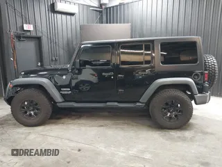 2015 Jeep Wrangler Unlimited Willys Wheeler with VIN 1C4BJWDG1FL749803, listed as a IAAI auction lot 41995132 with 156,595 mi miles and . Bid and sale history available at DreamBid. Image 15.