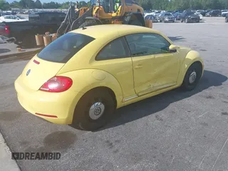2013 Volkswagen Beetle 2.5L with VIN 3VWHX7AT7DM613197, listed as a IAAI auction lot 41298890 with 130,219 mi miles and . Bid and sale history available at DreamBid. Image 4.
