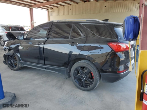 2020 Chevrolet Equinox Premier with VIN 2GNAXNEV0L6283956, listed as a Copart auction lot 53574055 with 121,132 mi miles and Clean Title. Bid and sale history available at carsss.com. Image 2.