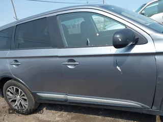 2016 Mitsubishi Outlander SE z VIN JA4AZ3A3XGZ049548, wystawiony jako IAAI lot #42393429 z przebiegiem 74 218 mil mil oraz . Historia ofert i sprzedaży dostępna na DreamBid. Obrazek 13.
