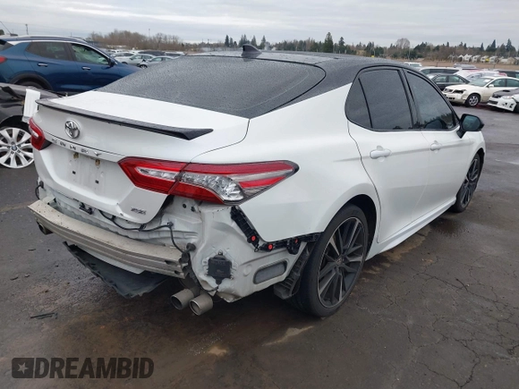 2020 Toyota Camry XSE with VIN 4T1K61AK7LU374885, listed as a IAAI auction lot 41579252 with 85,750 mi miles and . Bid and sale history available at DreamBid. Image 4.