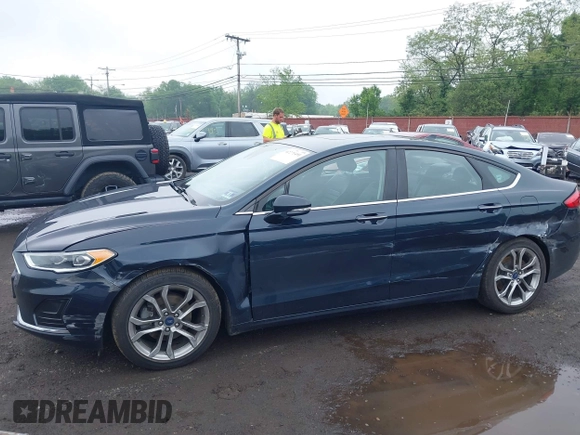 2020 Ford Fusion SEL z VIN 3FA6P0CD9LR183400, wystawiony jako IAAI lot #42271491 z przebiegiem 52 020 mil mil oraz . Historia ofert i sprzedaży dostępna na DreamBid. Obrazek 6.