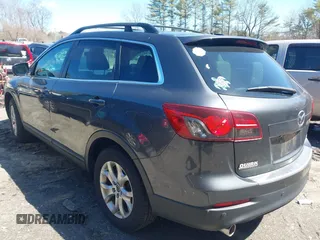 2015 Mazda CX-9 Touring with VIN JM3TB3CV1F0461854, listed as a IAAI auction lot 42068299 with 128,124 mi miles. Bid and sale history available at carsss.com. Image 3.