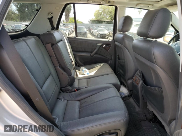 2004 Mercedes-Benz M-Class with VIN 4JGAB75EX4A470494, listed as a Copart auction lot 52024515 with 185,639 mi miles and Salvage Title. Bid and sale history available at carsss.com. Image 11.