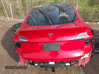 2021 Tesla Model Y Long Range with VIN 5YJYGDEE3MF212845, listed as a IAAI auction lot 41864260 with 43,451 mi miles. Bid and sale history available at carsss.com. Image 22.