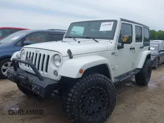 2015 Jeep Wrangler Unlimited Sahara с VIN 1C4BJWEG1FL506393, выставлен на аукционе IAAI как лот 42326900 с пробегом 100 538 миль миль и . История ставок и продаж доступна на DreamBid. Изображение 17.