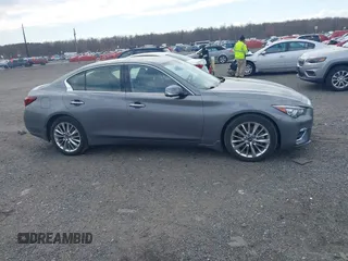 2021 Infiniti Q50 Luxe z VIN JN1EV7BRXMM751698, wystawiony jako IAAI lot #41855240 z przebiegiem 74 517 mil mil oraz . Historia ofert i sprzedaży dostępna na DreamBid. Obrazek 13.
