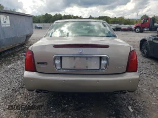 2004 Cadillac DeVille DHS z VIN 1G6KE57Y74U116879, wystawiony jako Copart lot #71017214 z przebiegiem 130 169 mil mil oraz Szkoda całkowita • Salvage title. Historia ofert i sprzedaży dostępna na DreamBid. Obrazek 6.