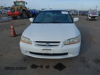 1999 Honda Accord LX with VIN JHMCG665XXC014090, listed as a IAAI auction lot 41765749 with 231,682 mi miles and . Bid and sale history available at DreamBid. Image 6.