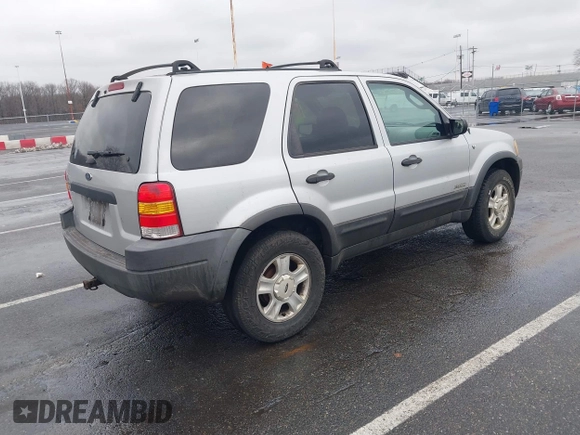 2002 Ford Escape XLT Choice with VIN 1FMYU04192KA82503, listed as a IAAI auction lot 41521335 with 128,349 mi miles. Bid and sale history available at carsss.com. Image 4.
