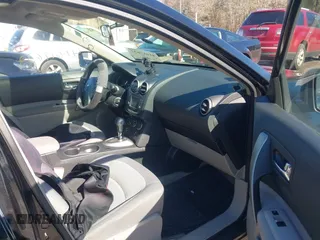 2013 Nissan Rogue S with VIN JN8AS5MV1DW600390, listed as a IAAI auction lot 41617632 with 106,584 mi miles and . Bid and sale history available at DreamBid. Image 5.