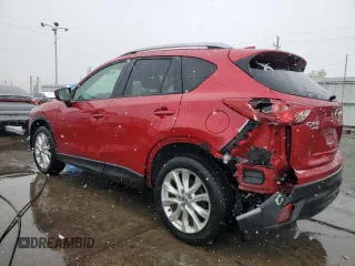 2014 Mazda CX-5 Grand Touring with VIN JM3KE4DY6E0309925, listed as a Copart auction lot 53521105 with 161,579 mi miles and Salvage Title. Bid and sale history available at carsss.com. Image 2.