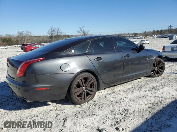 2012 Jaguar XJ with VIN SAJWA1CB1CLV31450, listed as a Copart auction lot 46883875 with 150,268 mi miles and Salvage Title. Bid and sale history available at DreamBid. Image 3.