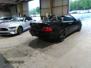 2000 Mercedes-Benz CLK 320/430 z VIN WDBLK65G5YT031236, wystawiony jako IAAI lot #41972975 z przebiegiem 144 665 mil mil oraz . Historia ofert i sprzedaży dostępna na DreamBid. Obrazek 4.