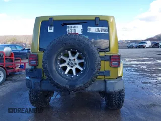 2007 Jeep Wrangler Unlimited Sahara with VIN 1J4GA59187L189519, listed as a IAAI auction lot 41204036 with 165,428 mi miles and . Bid and sale history available at DreamBid. Image 16.