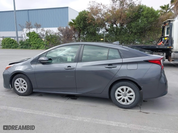 2019 Toyota Prius L Eco with VIN JTDKARFU9K3075219, listed as a IAAI auction lot 42113323 with 218,986 mi miles. Bid and sale history available at carsss.com. Image 14.