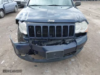 2010 Jeep Grand Cherokee Laredo with VIN 1J4PR4GK5AC138498, listed as a IAAI auction lot 41870740 with 130,551 mi miles. Bid and sale history available at carsss.com. Image 6.