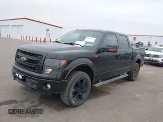2013 Ford F-150 XL with VIN 1FTFW1ET2DFB98634, listed as a IAAI auction lot 42016749 with 158,056 mi miles. Bid and sale history available at carsss.com. Image 2.